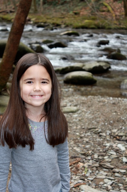 Mia in front of the beautiful river. 