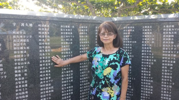 My mom at the WWII memorial site.  She is pointing out her uncle and great grandfather.  