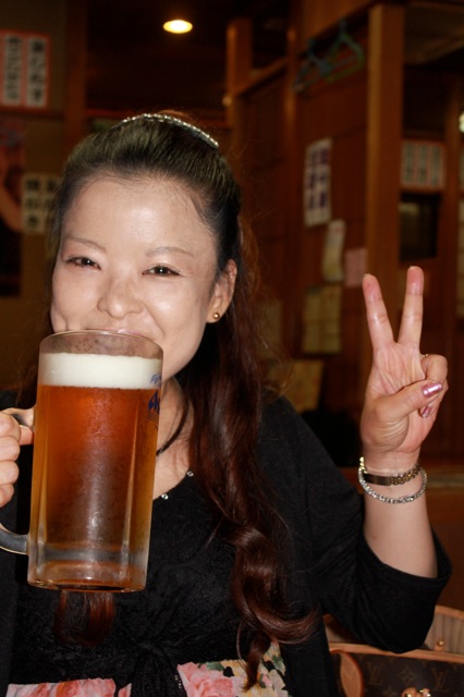 My cousin enjoying a tall mug of beer!