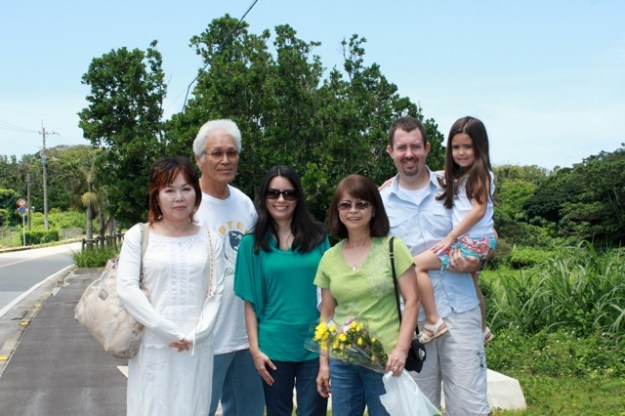 At my family gravesite. Reunited with my mom's Uncle and his wife. We had to cut through the jungle behind us to get to it.... Luckily, there were about 12 of us to hike through it together. Yikes!!! 