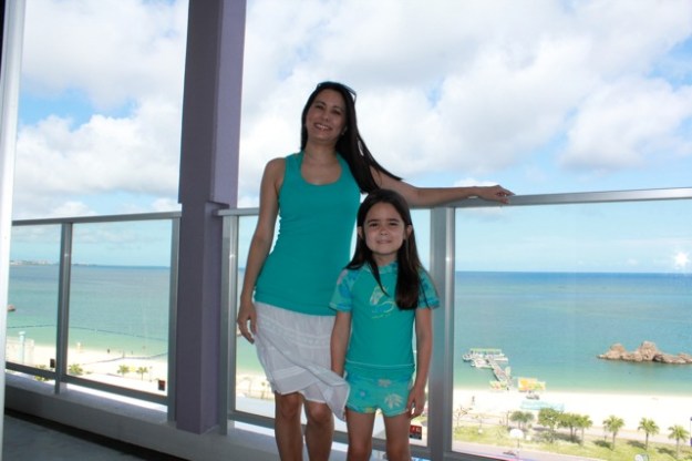 Mia and I on the balcony where we are staying in Okinawa... very close to where I was born! June 9, 2013. — at Okinawa｜沖縄.