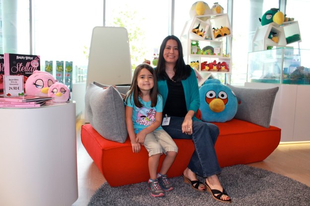 Mia and I sitting on one of the chairs in the store.  