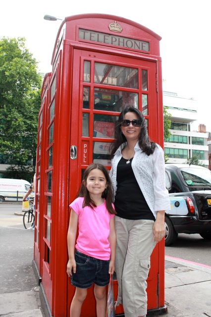 Mia and I in front of classic red telephone booths.  Mia asked, "What's a telephone booth?!?!" :)