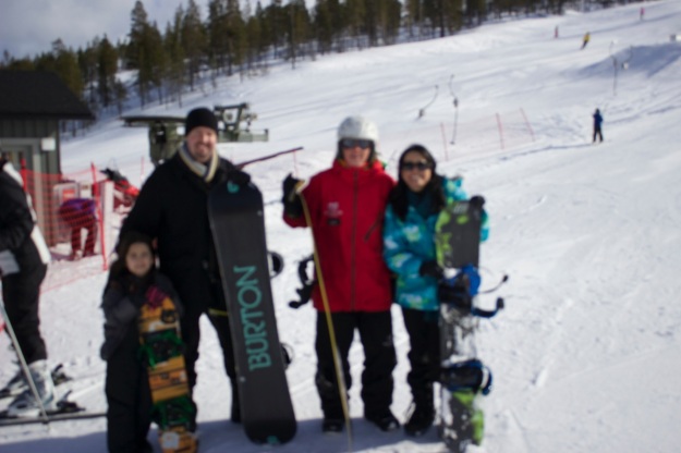 This one is a bit blurry (forgot to change the settings). This is our family with our amazing ski instructor, Leen! :)
