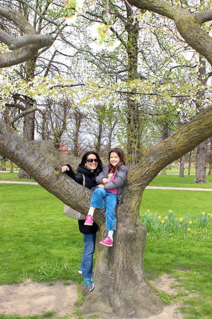 Mia and I having fun on the amazing cherry blossom tree at the King's Gardens.