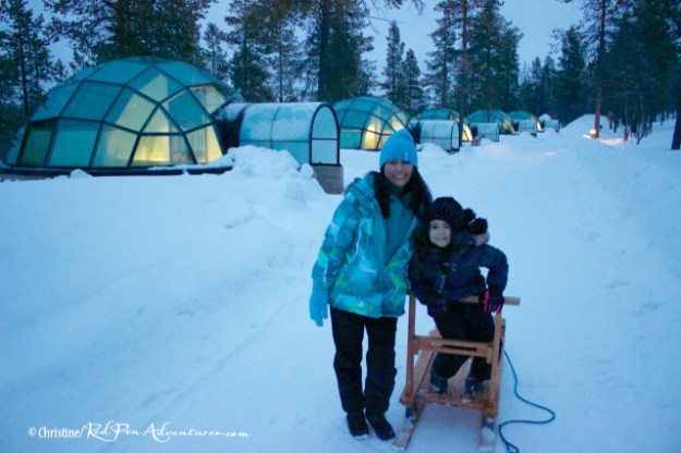 Mia and I in front of the glass igloos in Finland.